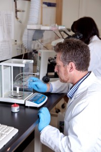 Scientist performs calibration service